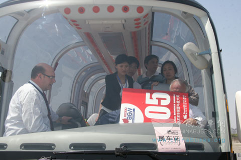 Jury members busying with checking buses 