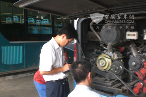 Service staff checking engine