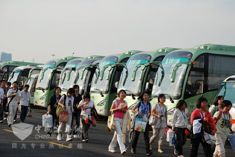 Landscape line consisting of King Long buses outside World Expo site