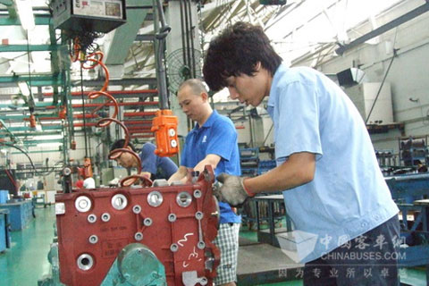 workers in the plant of Qijiang Gear