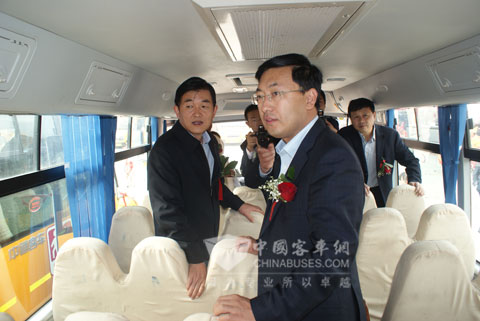The leaders attended the school buses